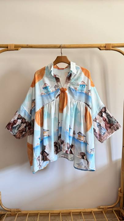 The afro painting poncho blouse