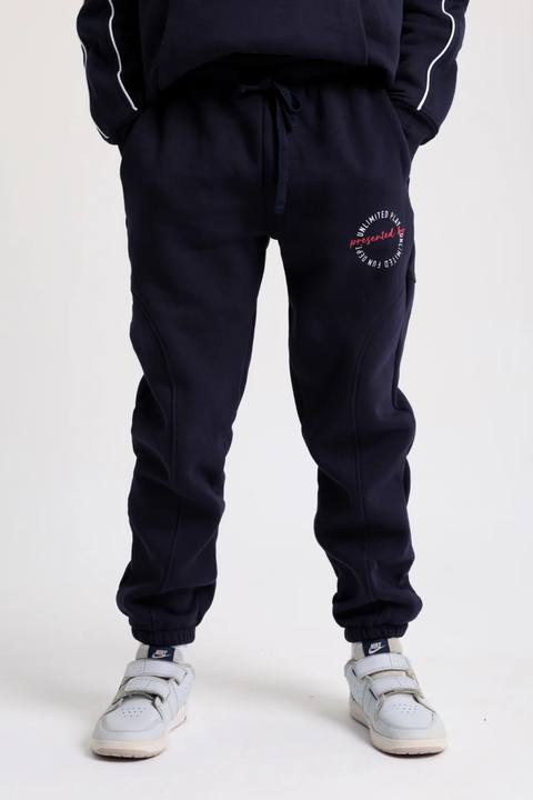cotton sweatpants – navy with "unlimited play presented by unlimited fun dept" print