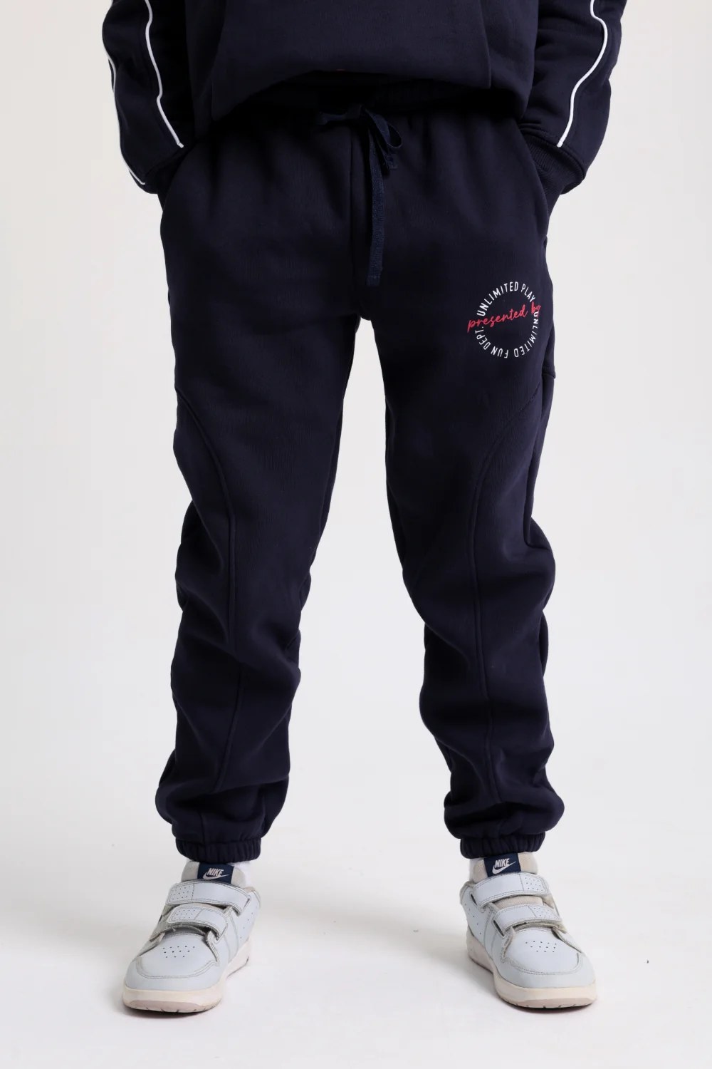 cotton sweatpants – navy with "unlimited play presented by unlimited fun dept" print