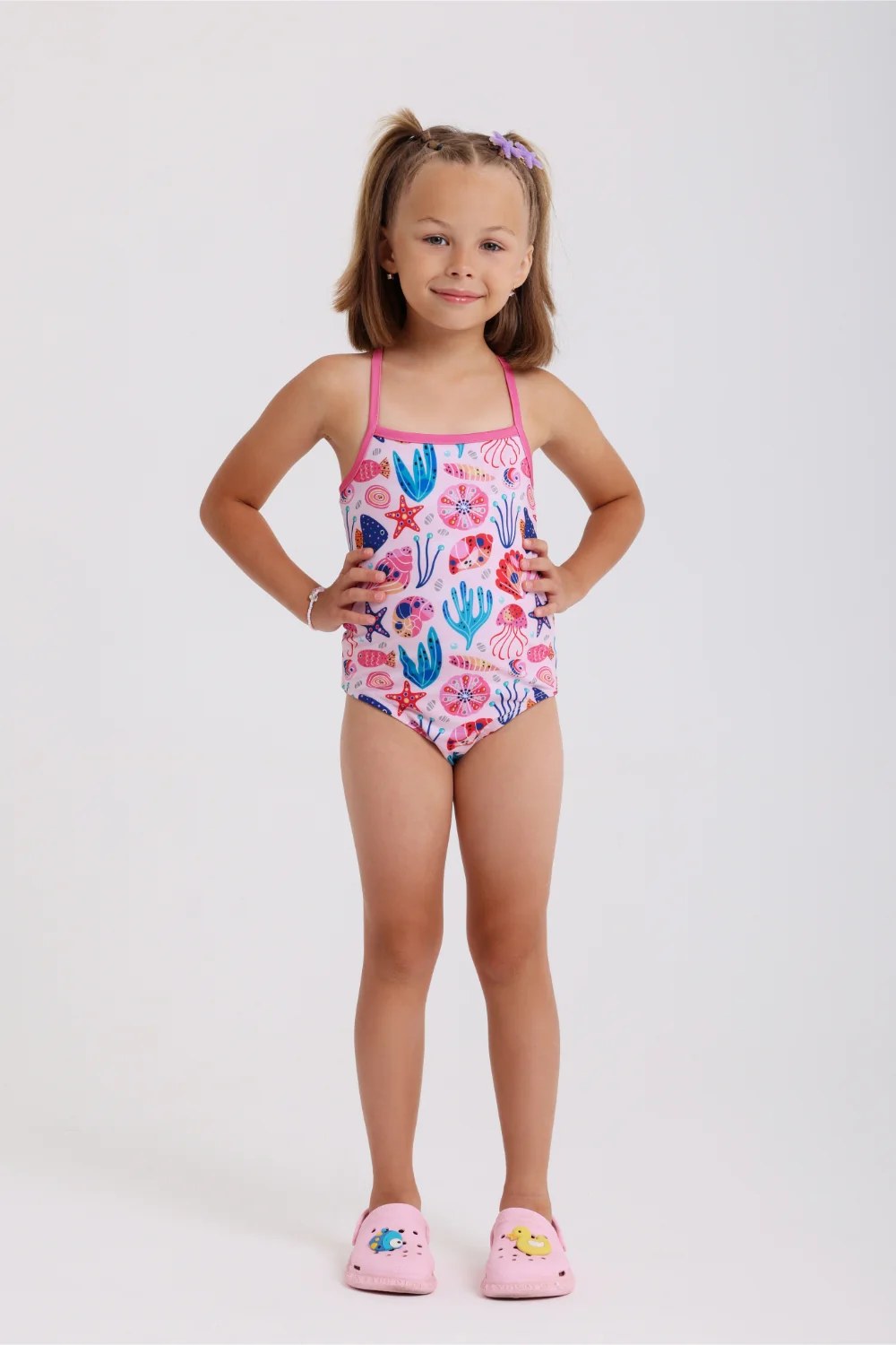 girls one-piece sleeveless swimsuit – pink with under the sea print