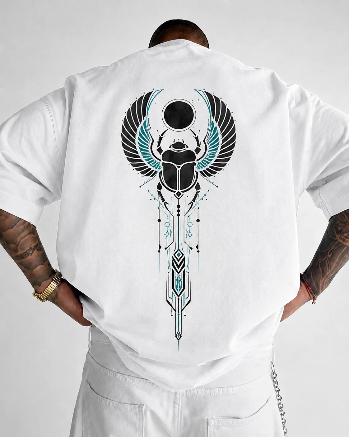 تيشيرت أوفر سايز قطن 100% بطبعة Winged Scarab أمامية وخلفية ستايل مصري رمزي بإطلالة ستريت وير قوية وعصرية