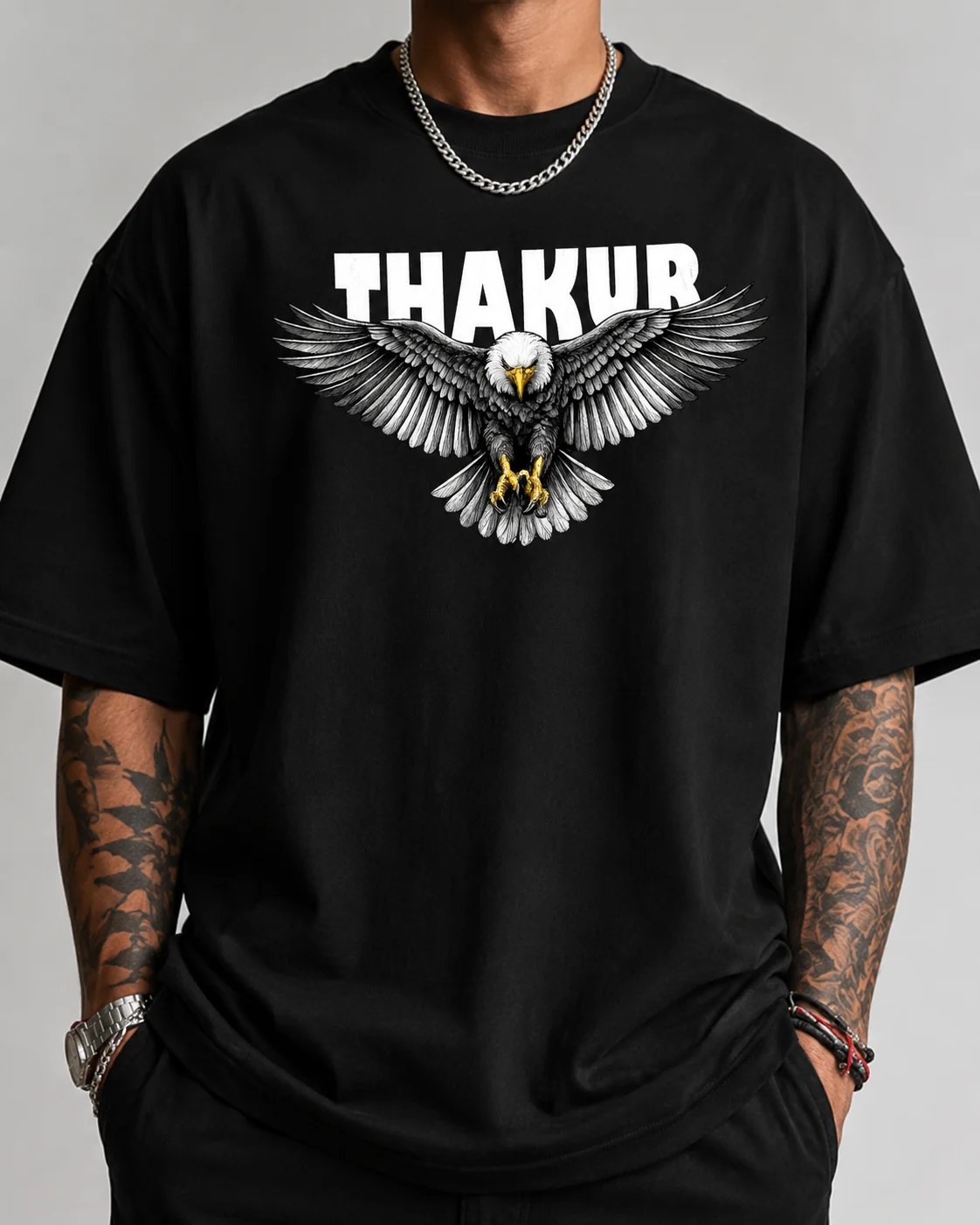 تيشيرت أوفر سايز بطبعة Thakur Eagle أمامية وخلفية ستايل جرافيك جريء بإطلالة ستريت وير قوية وملفتة