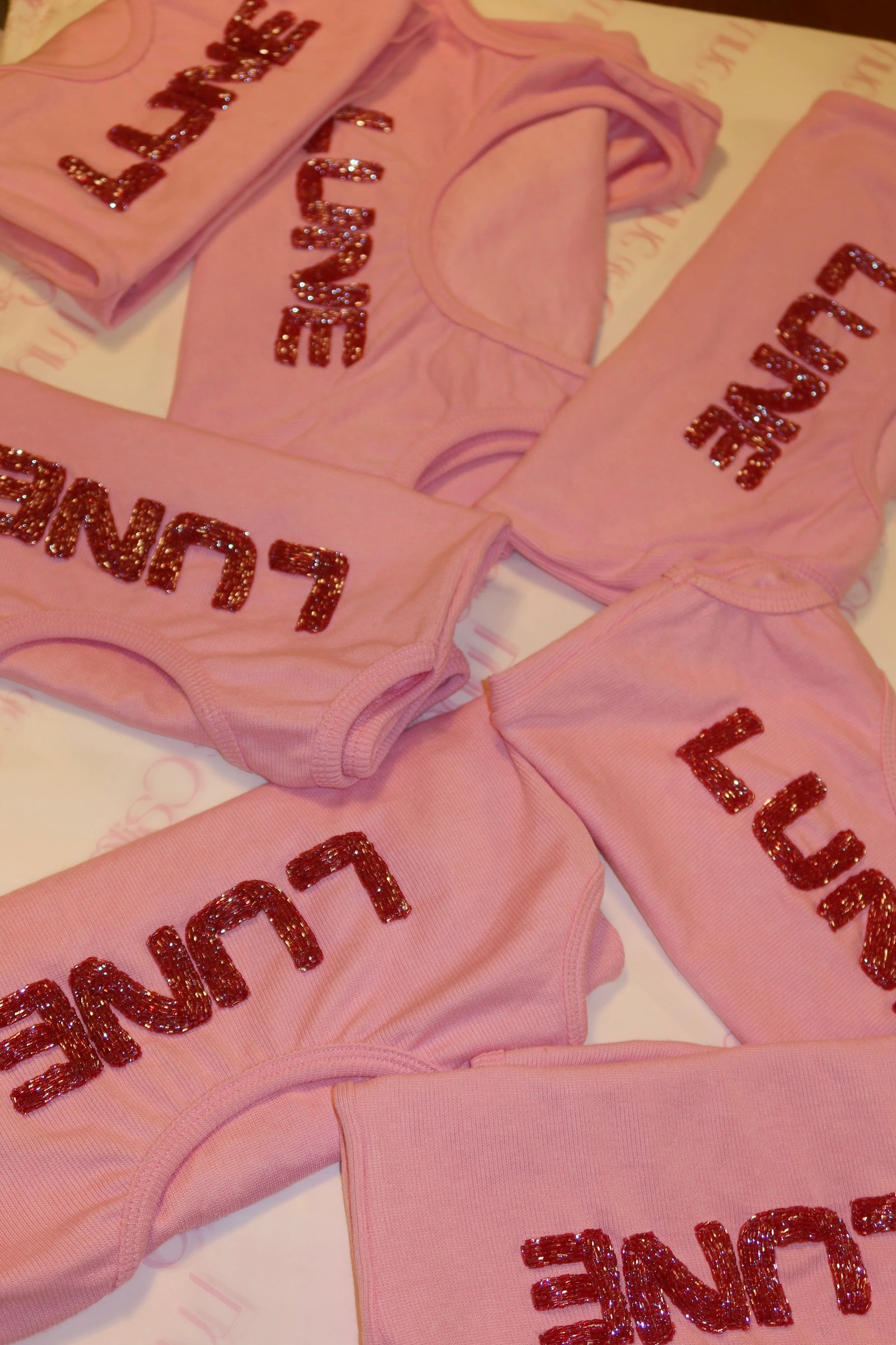 Pink lune embroidered tank top