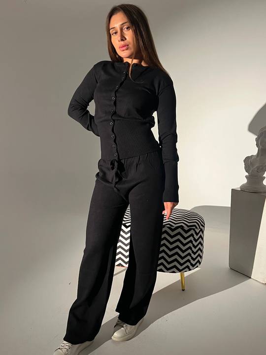 Barbie in black pants