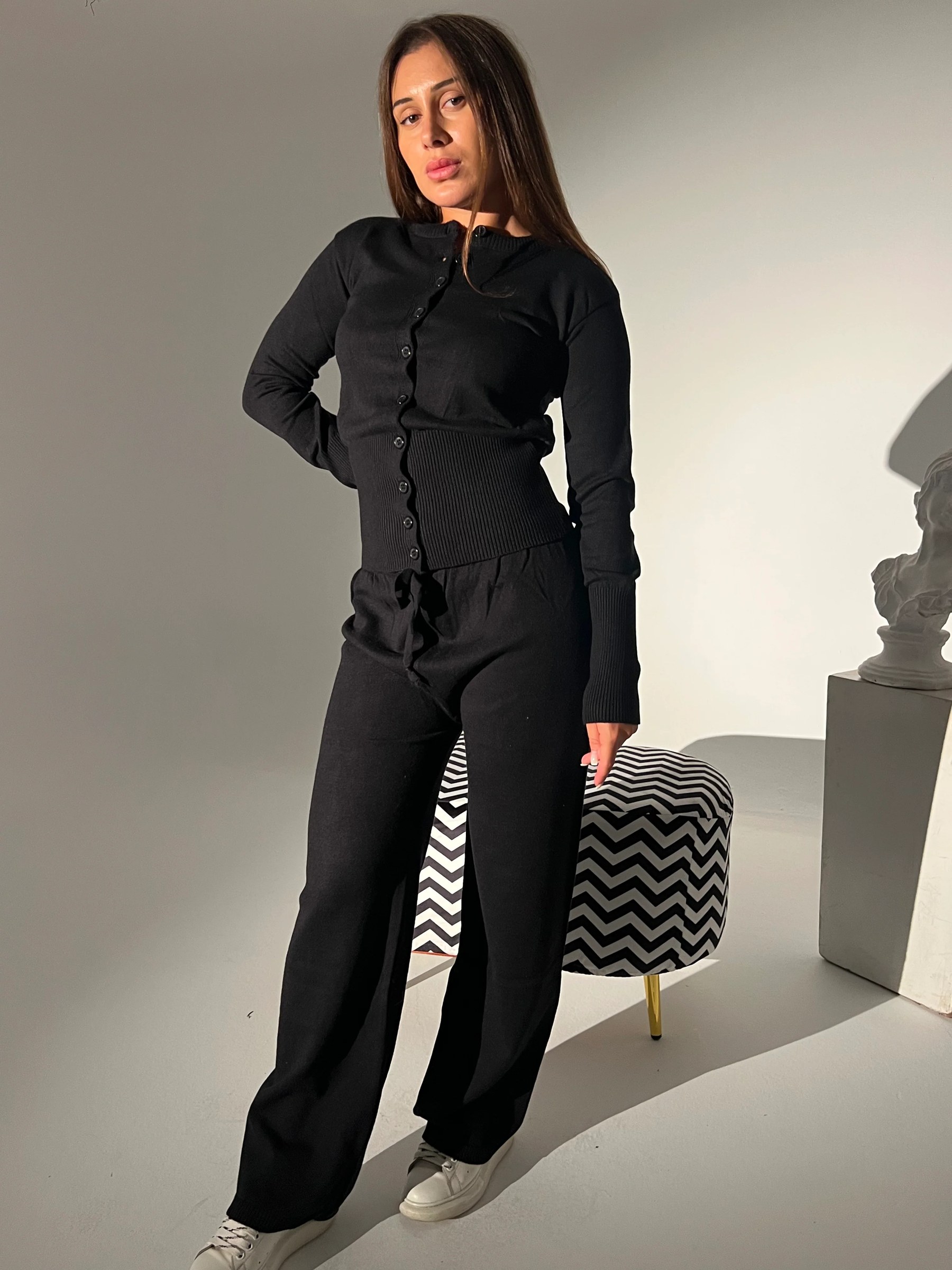 Barbie in black pants