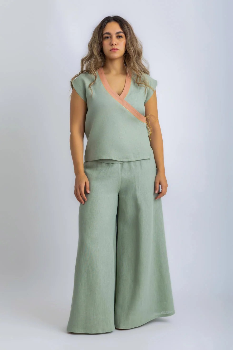 Linen wrap-detail sleeveless top with golden trim