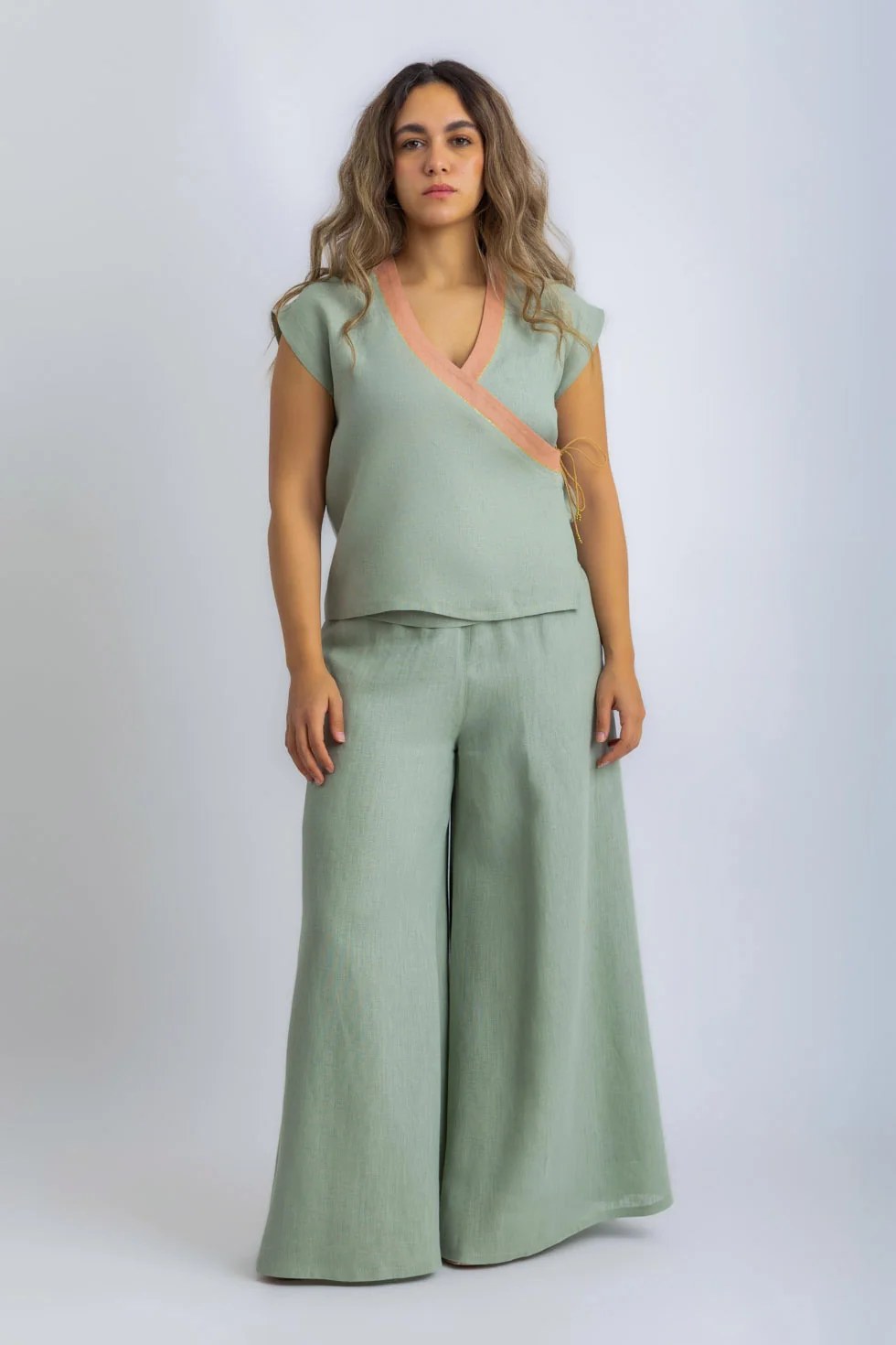 Linen wrap-detail sleeveless top with golden trim