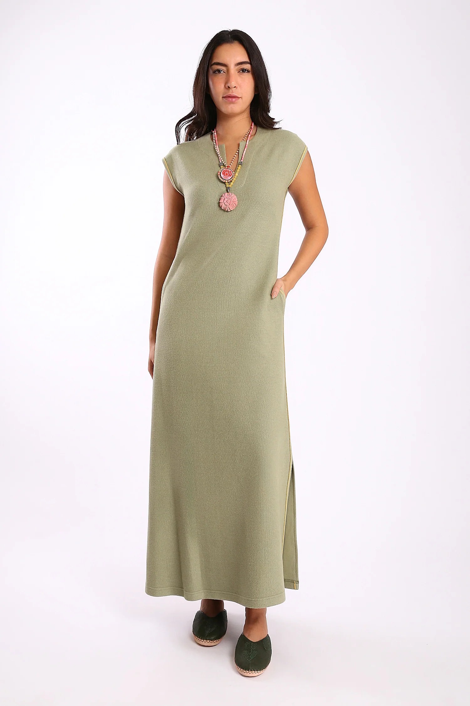 Long Sleeveless dress with side slits and pockets