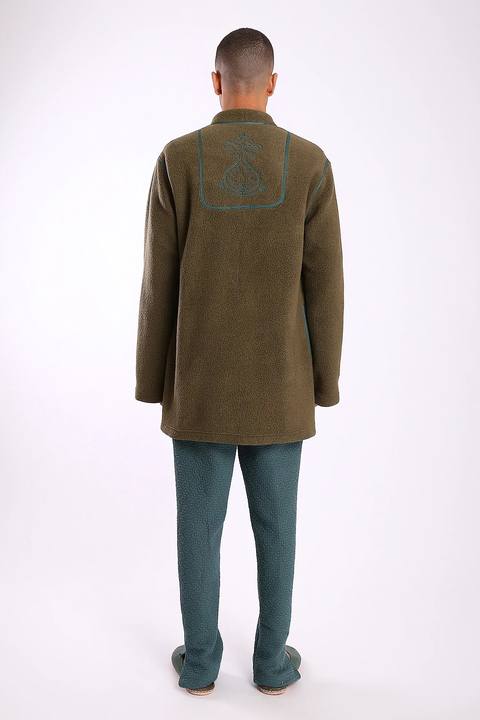 Jacket in faux fur with embroidery on the back