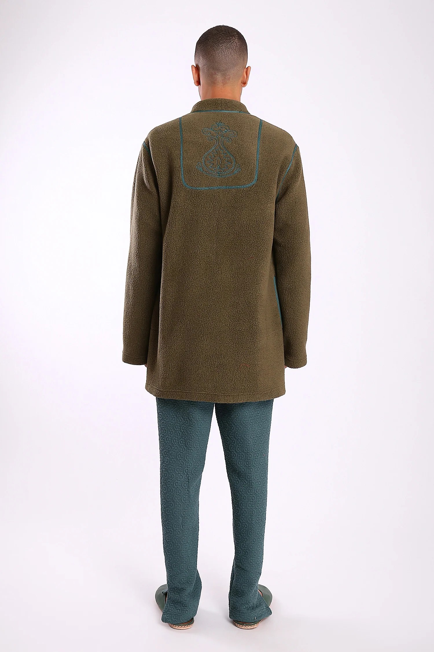 Jacket in faux fur with embroidery on the back