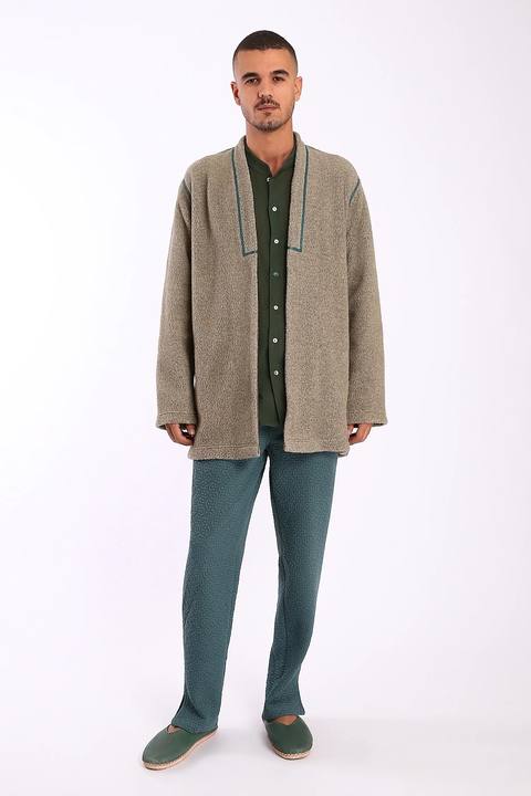 Jacket in faux fur with embroidery on the back