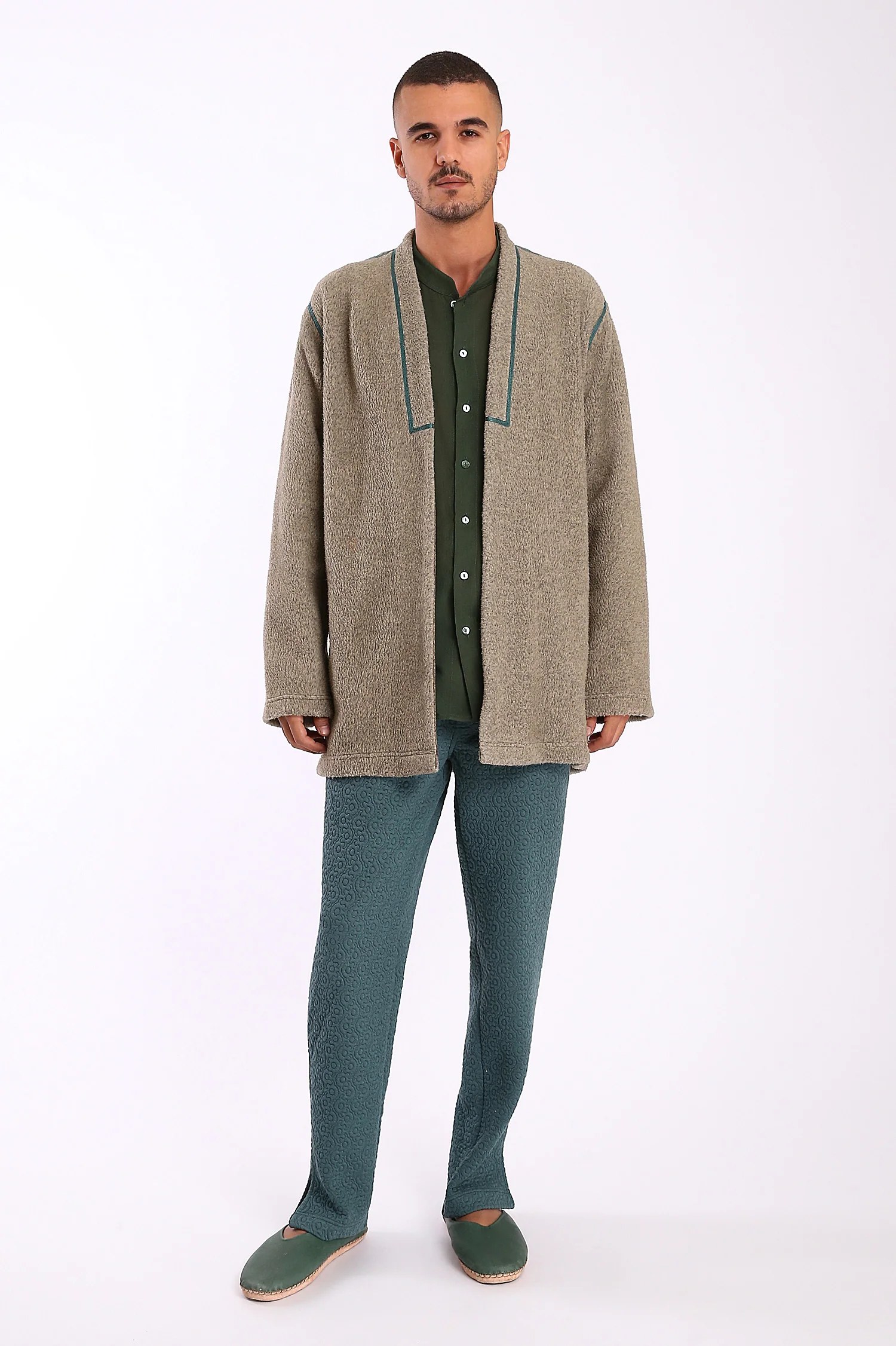 Jacket in faux fur with embroidery on the back