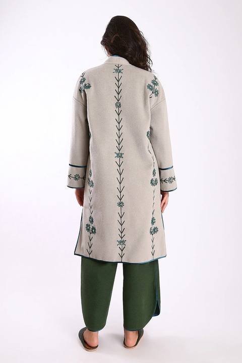 Short coat in wool blend with pockets