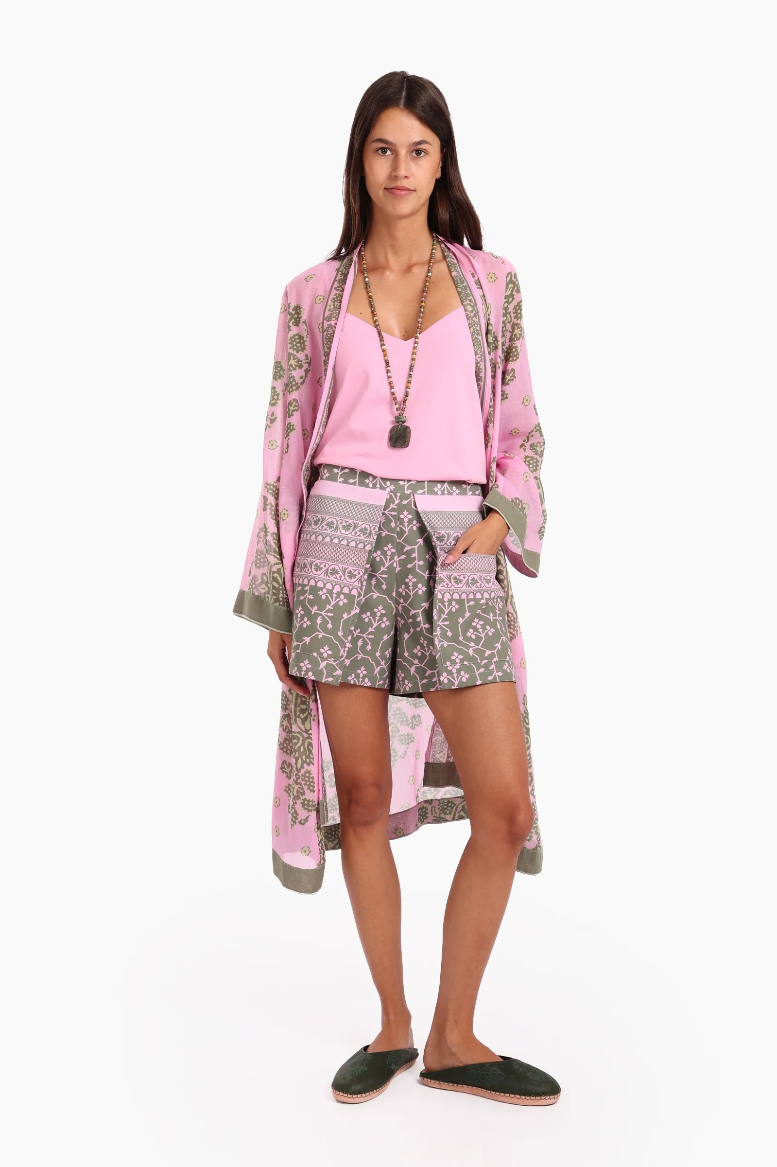 Shorts in printed cotton with front flaps