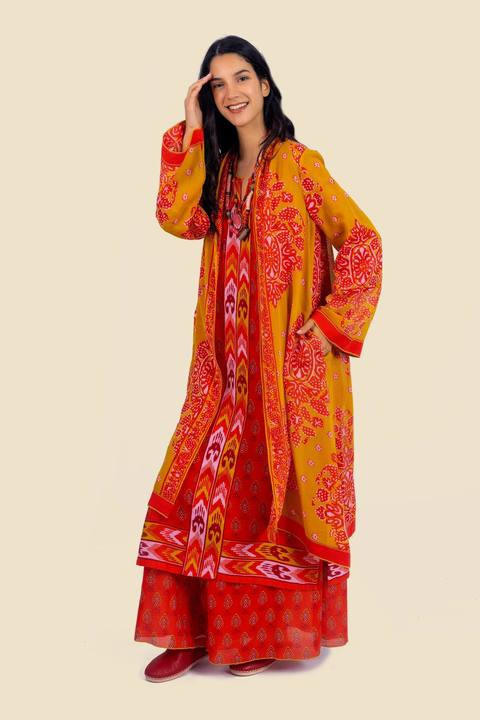 Coat in cotton voile with asymmetric hemline