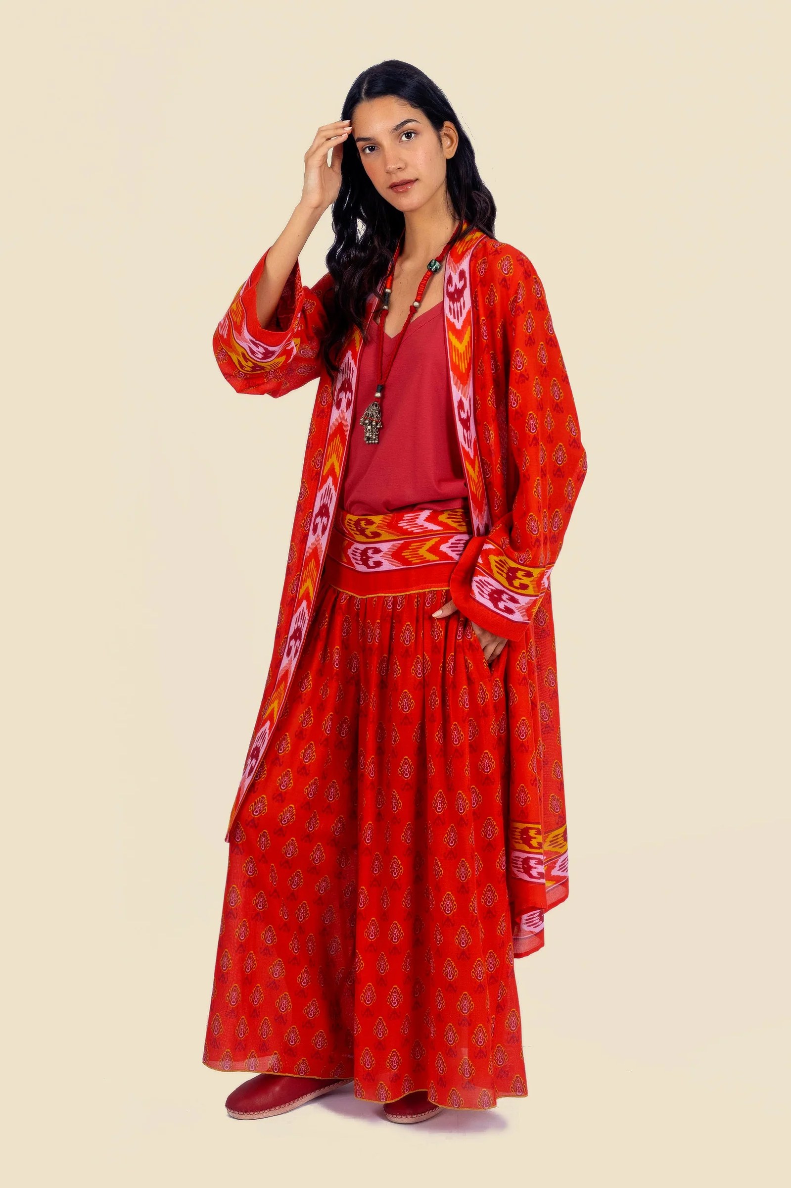 Coat in cotton gauze with asymmetric hemline