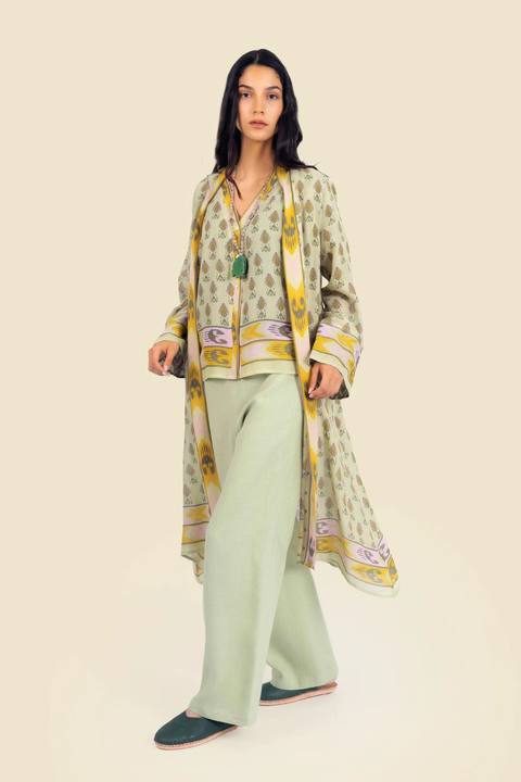 Coat in cotton gauze with asymmetric hemline