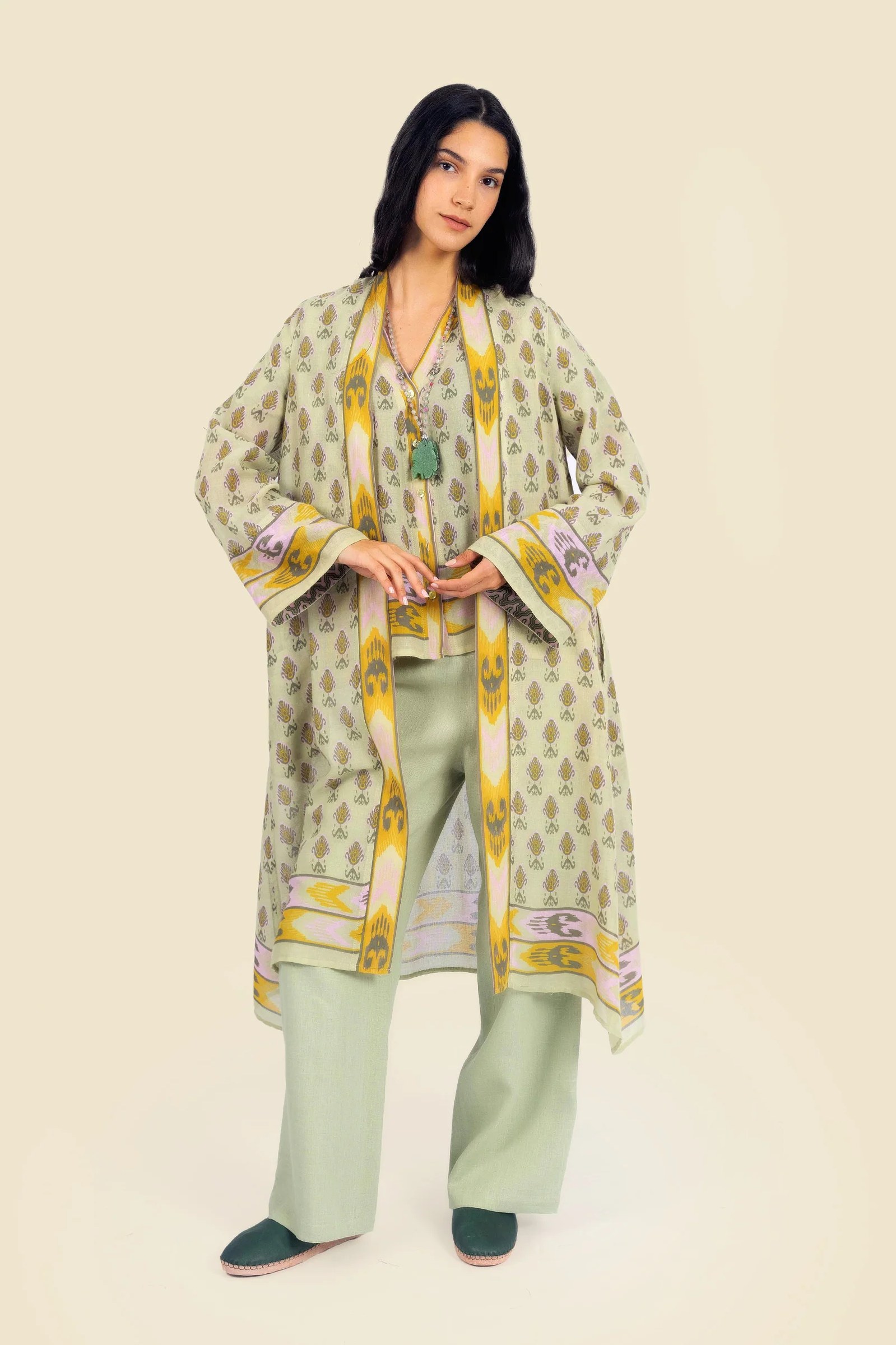 Coat in cotton gauze with asymmetric hemline