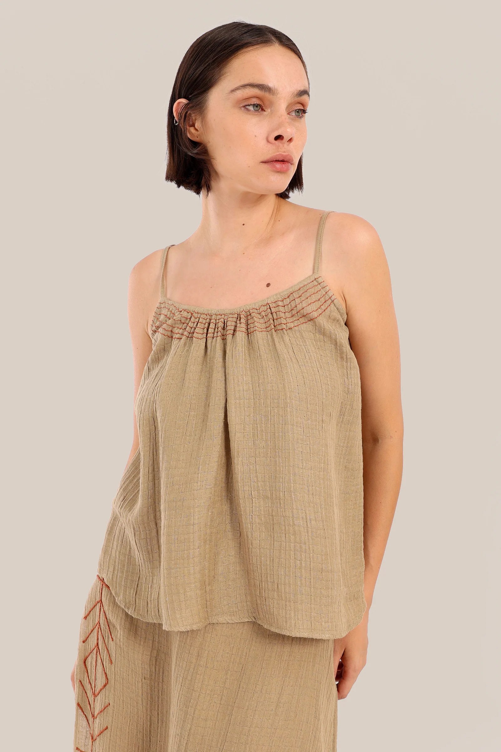 Sleeveless tank top with thin adjustable straps
