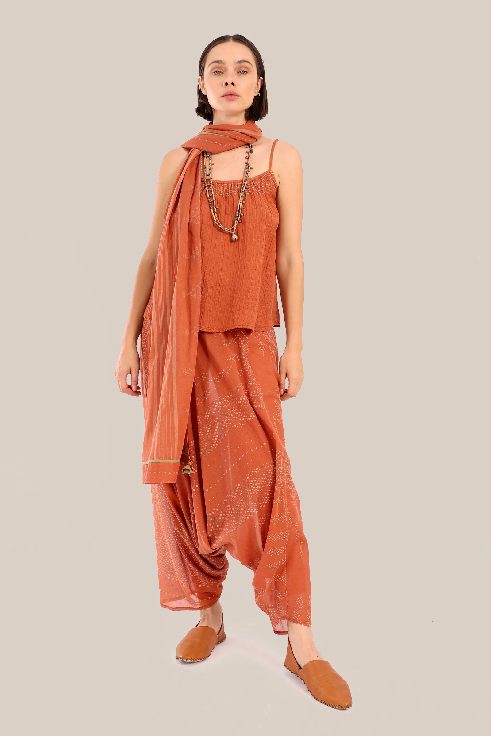 Sleeveless tank top with thin adjustable straps