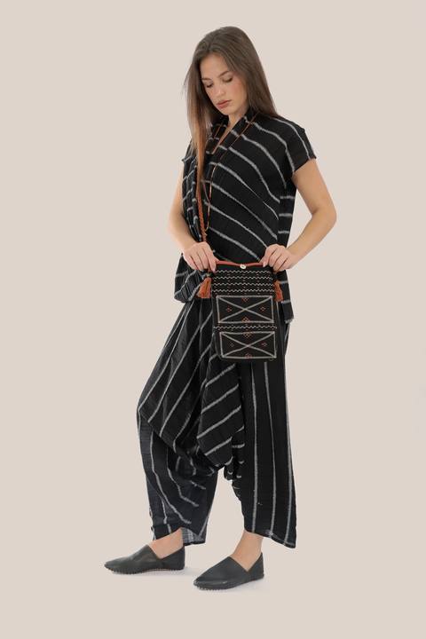 Sleeveless wrap top with crinkle striped and draped front