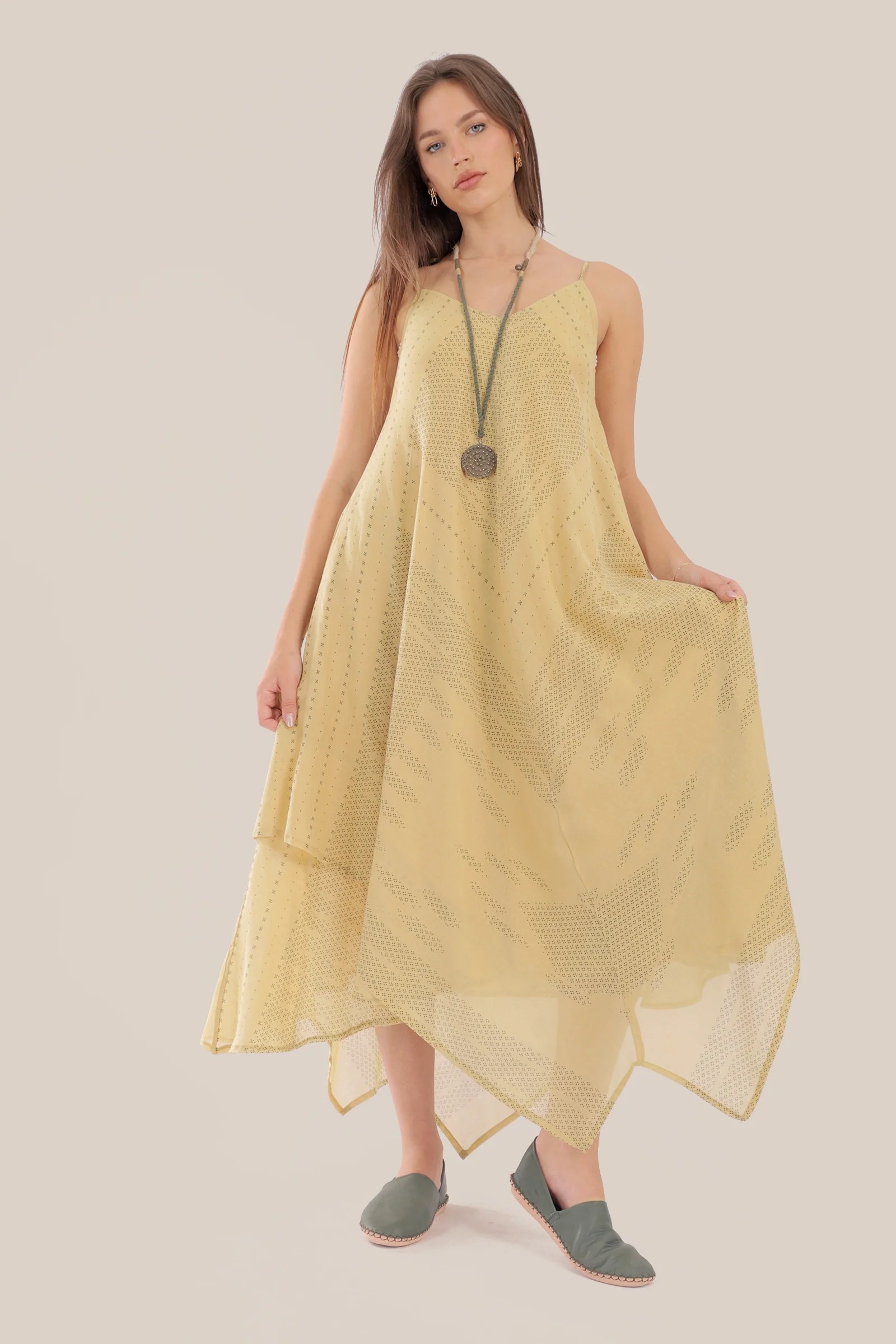 long Sleeveless dress with asymmetric hemline