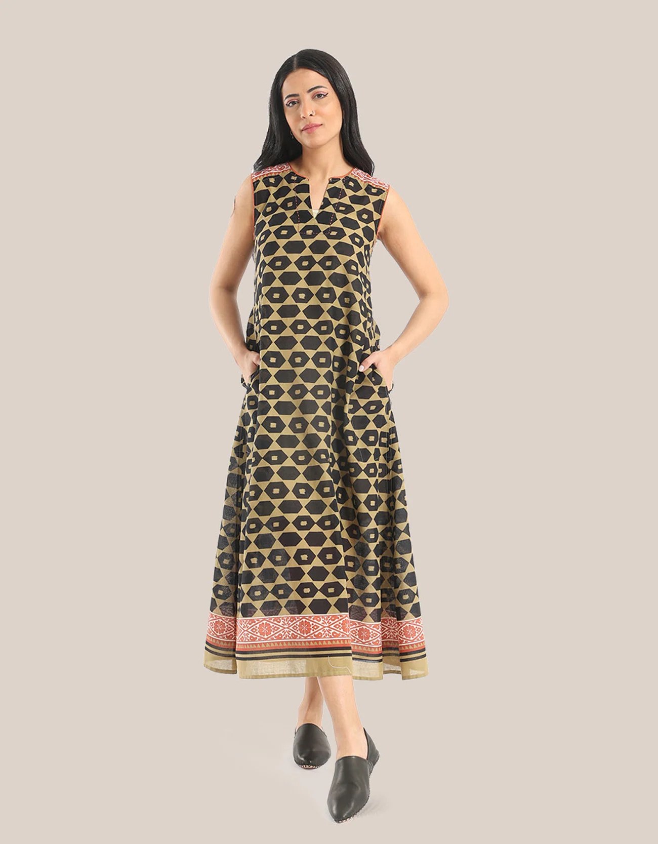 Sleeveless long dress with asymmetric hemline