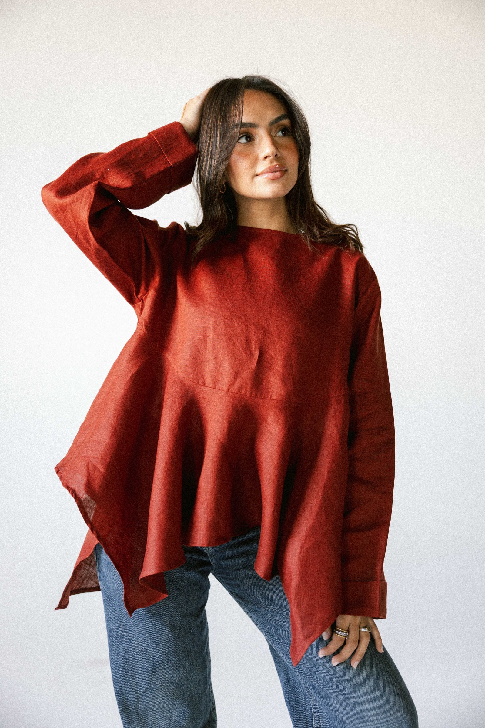 Ruffeled linen top in burnt red